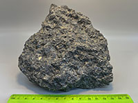 a gray rock with a crystaline texture